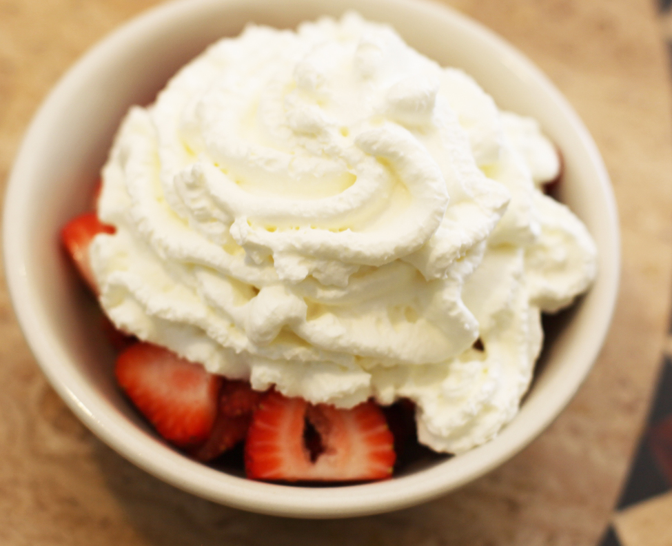 Strawberries and fresh whipped cream at Gaufres & Goods, 9 Aviles St.