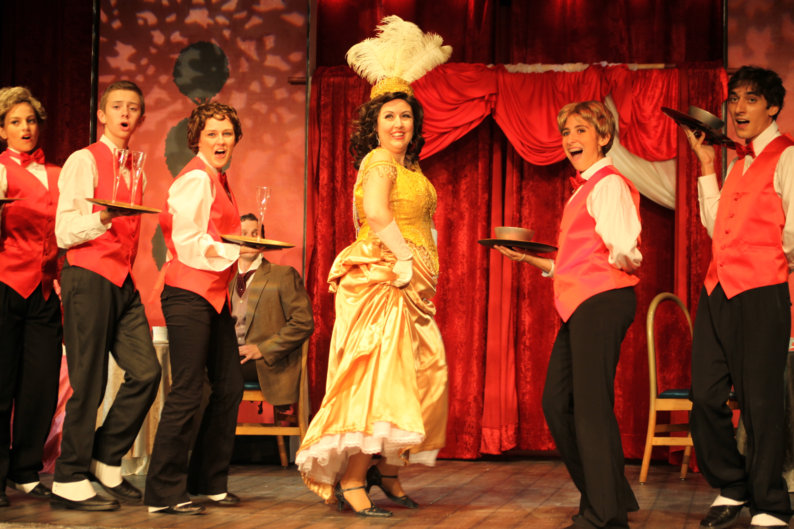 Kristin Pidcock, center, plays Dolly Levi in Hello, Dolly at Limelight Theatre, on stage June 5 through July 5 on the Matuza Main Stage. Photos by Renee Unsworth