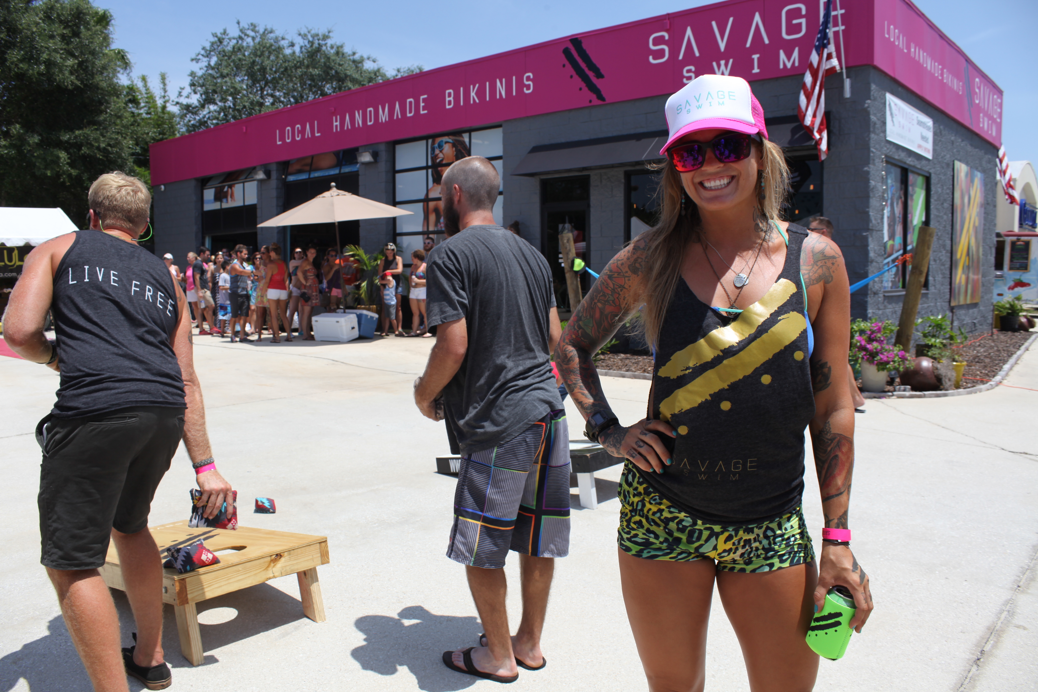 Savage Swim owner/founder Beth Reeb stands in front of her bikini business in St. Augustine Beach on July 11 during the grand opening event. Photos by Renee Unsworth